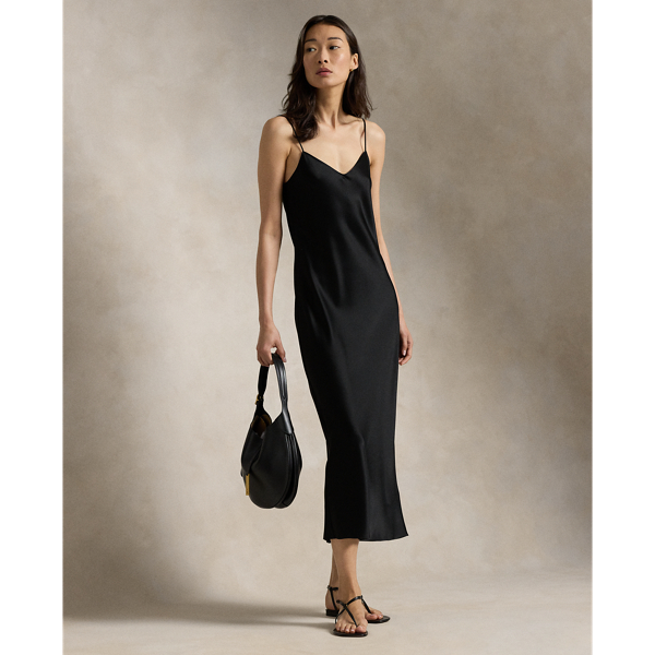 Cut on the bias, this double-faced satin slip dress has a midi-length silhouette with a fluid drape and adjustable spaghetti straps for a customisable fit.
