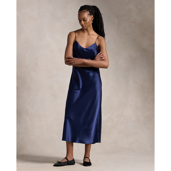 Cut on the bias, this double-faced satin slip dress has a midi-length silhouette with a fluid drape and adjustable spaghetti straps for a customisable fit.