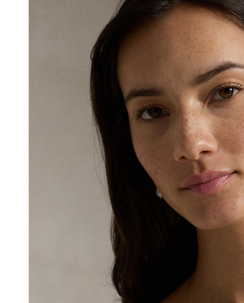 Cut on the bias, this double-faced satin slip dress has a midi-length silhouette with a fluid drape and adjustable spaghetti straps for a customisable fit.