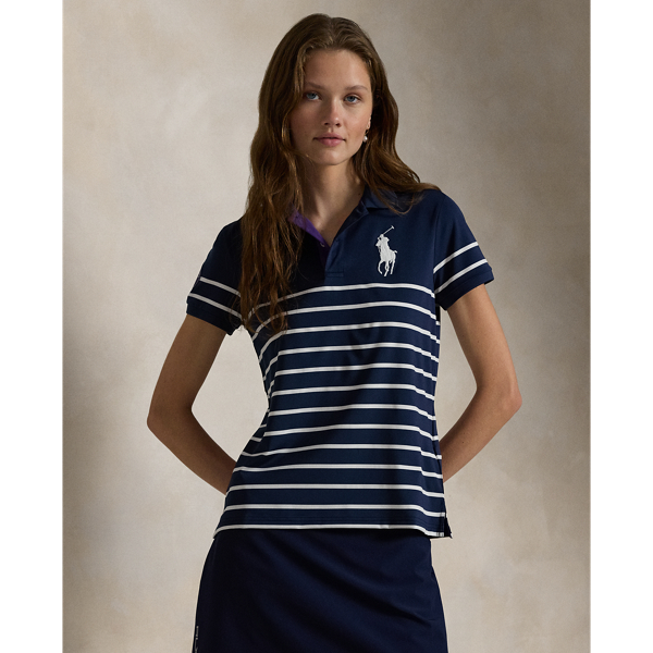 Part of our collection celebrating Wimbledon 2025, this moisture-wicking jersey Polo shirt was designed exclusively for the tournament's ballperson uniform. It features our signature embroidered Big Pony and an official Wimbledon logo patch.