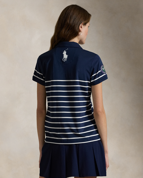 Part of our collection celebrating Wimbledon 2025, this moisture-wicking jersey Polo shirt was designed exclusively for the tournament's ballperson uniform. It features our signature embroidered Big Pony and an official Wimbledon logo patch.