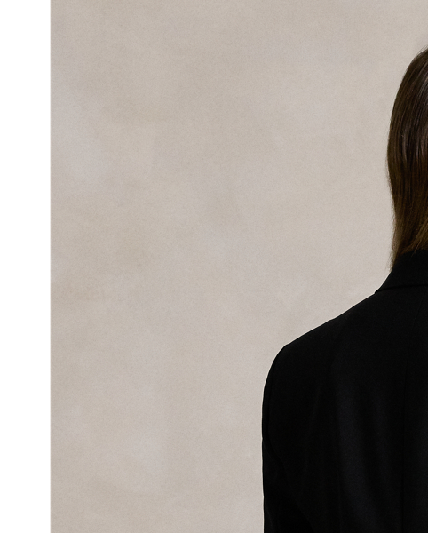 Tailored with Italian stretch wool faille, this blazer has a double-breasted silhouette with signature helmet-and-mallet-engraved metal buttons.