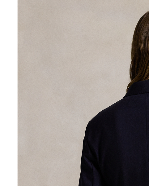 Tailored with Italian stretch wool faille, this blazer has a double-breasted silhouette with signature helmet-and-mallet-engraved metal buttons.