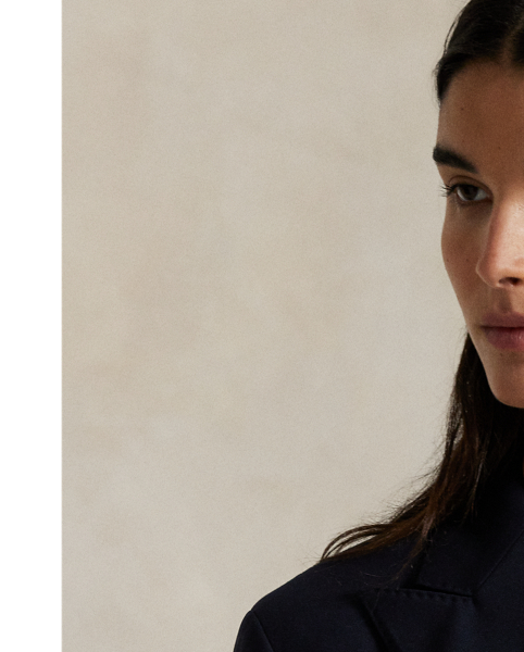 A classic wardrobe staple, this menswear-inspired blazer unites stretch wool faille with tailored details such as peak lapels and a double-breasted silhouette.