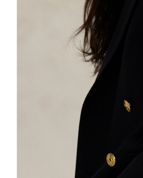 A classic wardrobe staple, this menswear-inspired blazer unites stretch wool faille with tailored details such as peak lapels and a double-breasted silhouette.