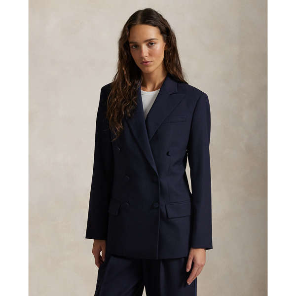 Tailored for a double-breasted silhouette with silk faille–covered buttons, this elegant blazer unites a luxurious Italian wool shell and silk peak lapels.