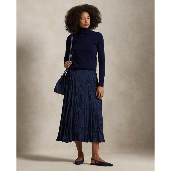 This satin skirt is cut for an A-line silhouette and features an allover crinkled texture.