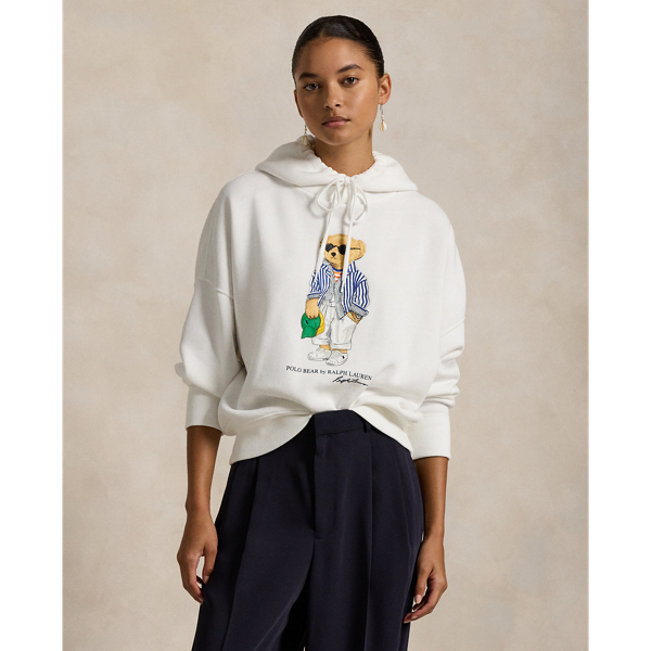  Ralph Lauren Lauren's signature logo and mascot, the Polo Bear, is rubber-printed at the front of this soft fleece hoodie.