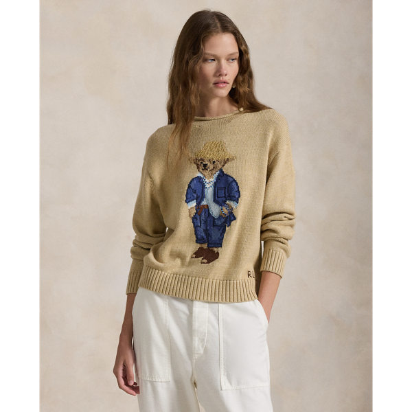This rollneck jumper showcases an intarsia-knit rendering of the Polo Bear with hand-embroidered and beaded details.