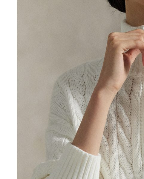 Combining the casual styling of a pullover with our iconic cable-knit construction, this quarter-zip jumper is crafted from chunky cotton yarn and meticulously embroidered with our signature Pony on the chest.