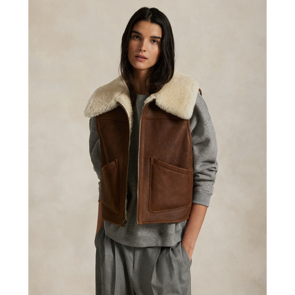 Rich in colour and luxurious to the touch, this full-zip gilet is crafted with Icelandic lamb shearling and features a wide-spread collar and front waist pockets.