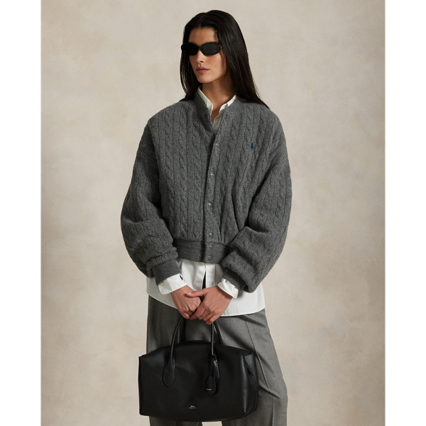 Merging the relaxed styling of a bomber jacket with our classic cable-knit construction, this lightly filled layer is rendered in Italian wool and cashmere with a diamond-quilted lining. Our embroidered Pony adds a signature finish.