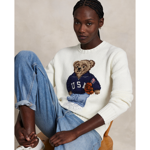 This cotton-and-linen crewneck jumper showcases an intarsia-knit rendering of the Polo Bear donning a signature  Ralph Lauren Lauren look. Our monogram logo is cross-stitched at the hem.