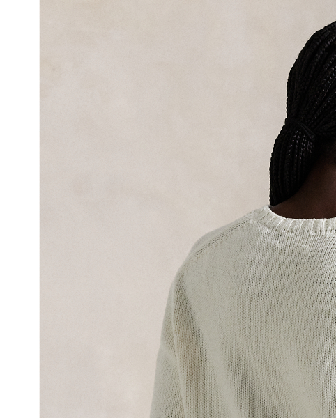 This cotton-and-linen crewneck jumper showcases an intarsia-knit rendering of the Polo Bear donning a signature  Ralph Lauren Lauren look. Our monogram logo is cross-stitched at the hem.