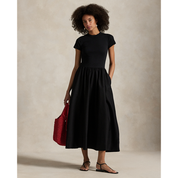 This versatile dress pairs a fitted cotton crewneck bodice with a sweeping A-line poplin skirt that features shirring at the waist for added volume.