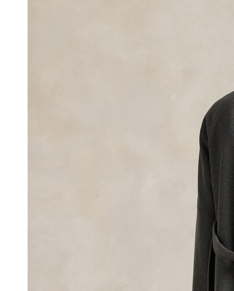 Heavyweight Italian cashmere brings luxurious warmth and softness to this double-breasted trench coat, which is finished with a buckled self-belt at the waist.