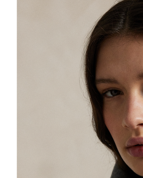 Heavyweight Italian cashmere brings luxurious warmth and softness to this double-breasted trench coat, which is finished with a buckled self-belt at the waist.