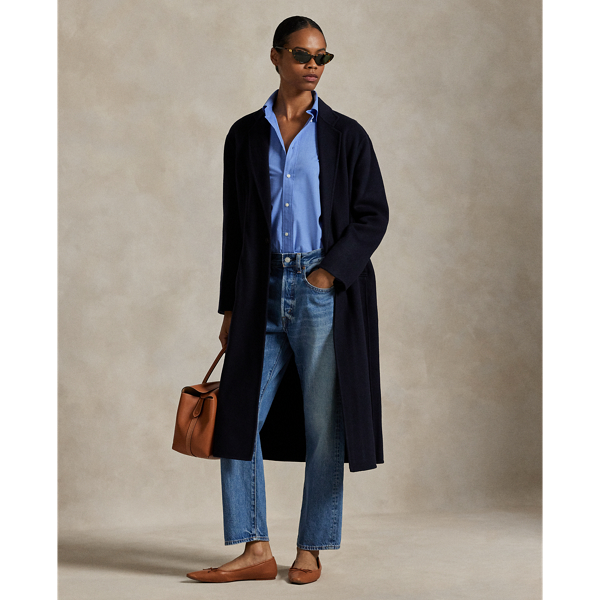 Rendered in double-faced brushed Italian wool for a sumptuous weight and drape, this overcoat is defined by traditional tailoring details. The oversize silhouette features notch lapels, waist darts and menswear-inspired besom pocketing.