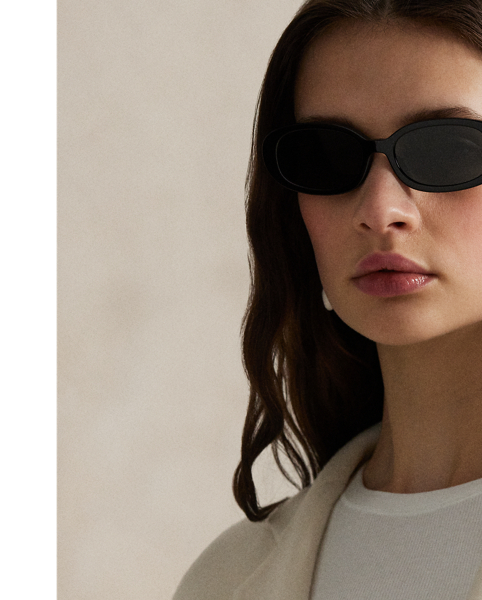 Rendered in double-faced brushed Italian wool for a sumptuous weight and drape, this overcoat is defined by traditional tailoring details. The oversize silhouette features notch lapels, waist darts and menswear-inspired besom pocketing.