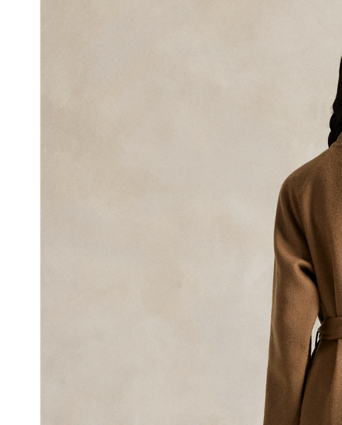 Italian wool and cashmere come together to create this version of the classic balmacaan coat, which is cut for a relaxed fit and paired with a buckled self-belt.