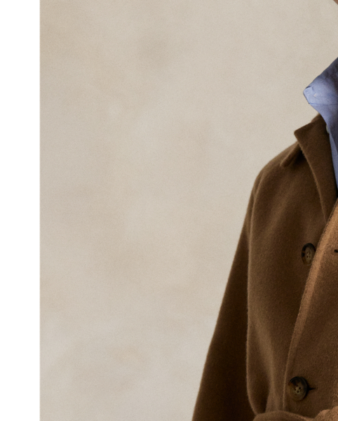 Italian wool and cashmere come together to create this version of the classic balmacaan coat, which is cut for a relaxed fit and paired with a buckled self-belt.