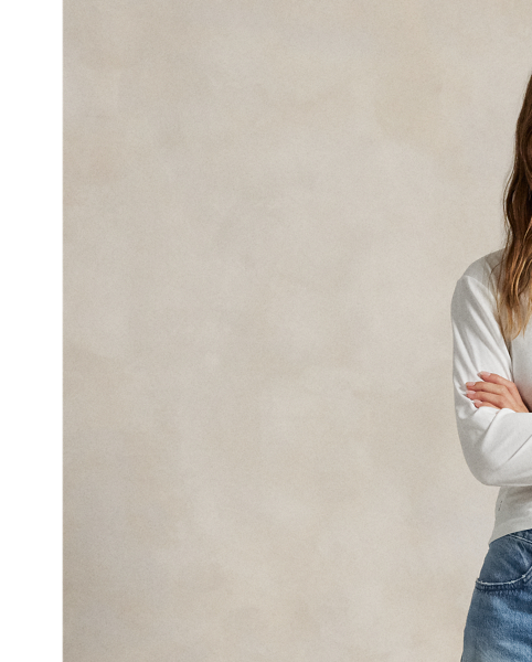 Washed for a medium indigo hue, this version of our Relaxed Tapered jean is crafted from non-stretch cotton denim and features subtle distressed details for a lived-in look.