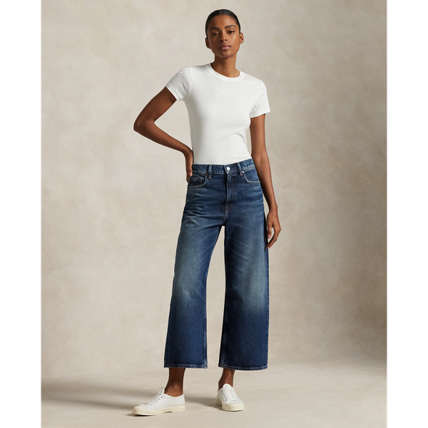 Designed for a cropped, wide-leg silhouette, these high-rise jeans are crafted from medium-weight Turkish denim with authentic slub character. The dark indigo wash has a vintage-inspired look thanks to uneven hand-sanding, whiskering and grinding on the seams.