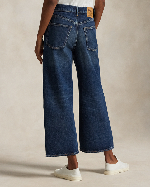 Designed for a cropped, wide-leg silhouette, these high-rise jeans are crafted from medium-weight Turkish denim with authentic slub character. The dark indigo wash has a vintage-inspired look thanks to uneven hand-sanding, whiskering and grinding on the seams.