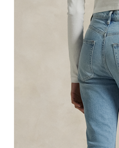 Crafted with Turkish denim, this High-Rise Super-Slim jean is dyed for a versatile light wash and treated with a combination of whiskering and subtle hand-sanding for a lived-in finish.