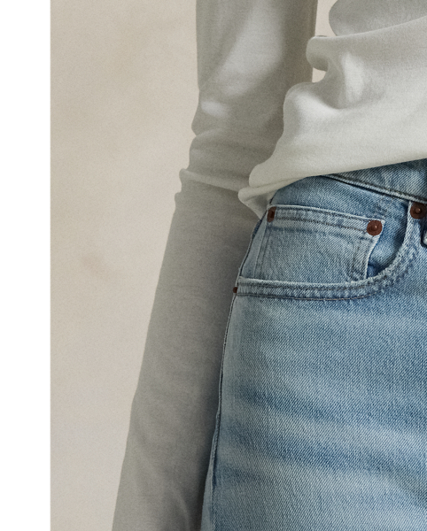 Crafted with Turkish denim, this High-Rise Super-Slim jean is dyed for a versatile light wash and treated with a combination of whiskering and subtle hand-sanding for a lived-in finish.