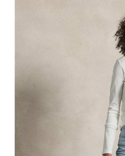 Crafted with Turkish denim, this High-Rise Super-Slim jean is dyed for a versatile light wash and treated with a combination of whiskering and subtle hand-sanding for a lived-in finish.