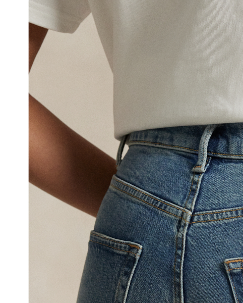 Crafted with Turkish right-hand twill, this High-Rise Super-Slim jean is dyed for a versatile medium wash and treated with a combination of whiskering and subtle hand-sanding for a lightly worn finish.