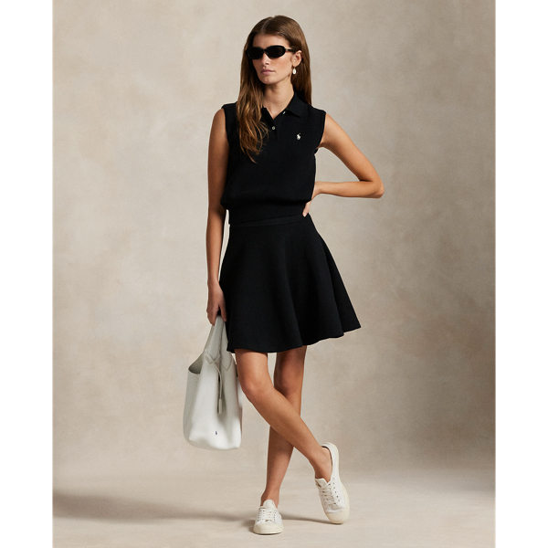 Finely knit with lightweight yarns for a horizontal construction, this cotton-blend circle skirt features a flared, A-line silhouette and pull-on styling.