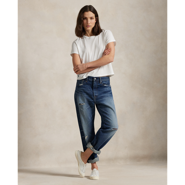 Cut with medium-weight cotton denim, this Slouch Tapered jean is designed for a perfectly worn, vintage-inspired look. The indigo wash is combined with uneven hand-sanding and grinding throughout.