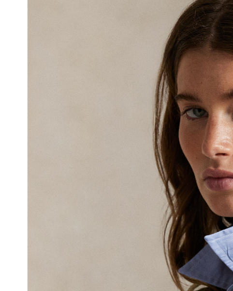 Printed for a surplus-inspired motif, this cotton field jacket balances a cropped silhouette with traditional details, including a buttoned storm placket over a concealed zip closure, shoulder epaulets and patch pockets. The authentic bi-swing construction features a drawstring waist and raw hem.