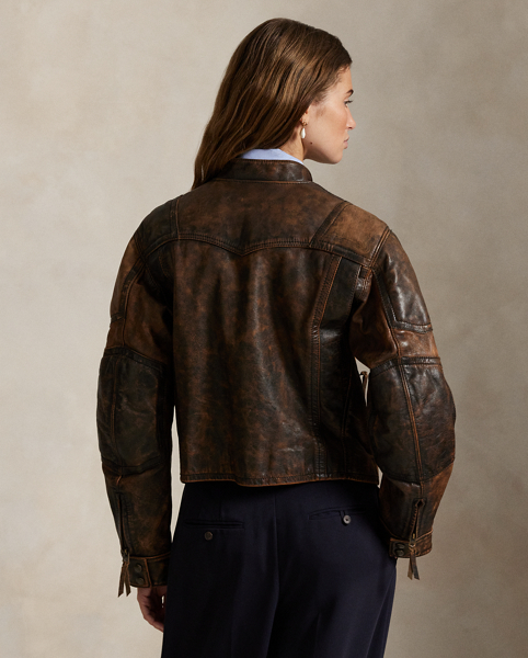 Designed for the look of a broken-in vintage find, this leather moto jacket is treated for a unique, crackled appearance with distinct nuances of shading that will continue to age and fade over time. The classic silhouette features articulated sleeves with padded shoulder and elbow patches, along with an allover diamond-quilted lining.