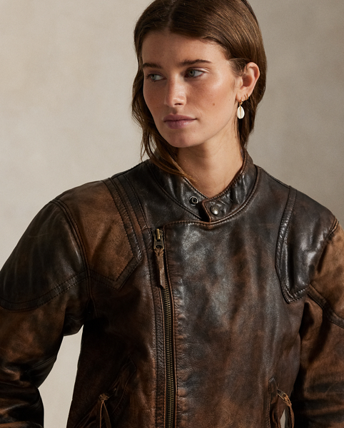 Designed for the look of a broken-in vintage find, this leather moto jacket is treated for a unique, crackled appearance with distinct nuances of shading that will continue to age and fade over time. The classic silhouette features articulated sleeves with padded shoulder and elbow patches, along with an allover diamond-quilted lining.