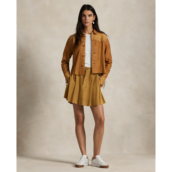 Cut for a high-rise, A-line silhouette that hits higher on the thigh, this sueded leather skirt features details reminiscent of tailored trousers, including a pleated construction and back waist welt pockets.