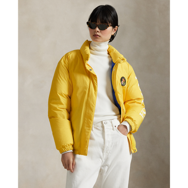Distinguished by a sporty sensibility, this puffer jacket merges an interior quilted construction with 750-fill-power down for premium warmth. It features a signature crest patch at the chest and our "Polo USA" logo printed along the left sleeve.