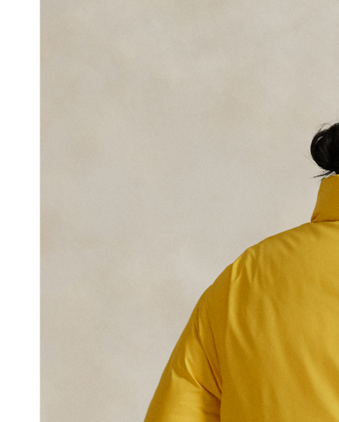 Distinguished by a sporty sensibility, this puffer jacket merges an interior quilted construction with 750-fill-power down for premium warmth. It features a signature crest patch at the chest and our "Polo USA" logo printed along the left sleeve.