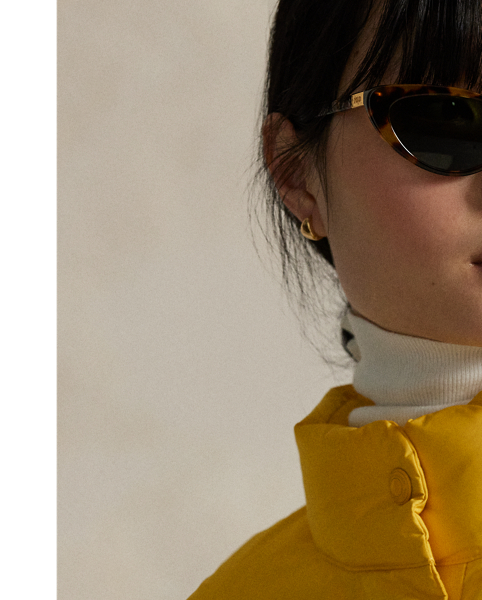 Distinguished by a sporty sensibility, this puffer jacket merges an interior quilted construction with 750-fill-power down for premium warmth. It features a signature crest patch at the chest and our "Polo USA" logo printed along the left sleeve.