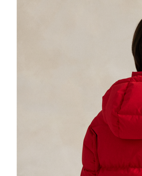 Combining a water-repellent shell and insulating, 750-fill-power down, this quilted jacket features a removable drawstring hood, two-way zip placket and protective snapped storm placket. Our signature embroidered Pony adorns the chest.