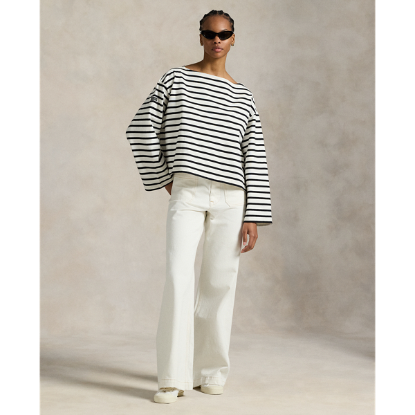 These sailor-style trousers combine a high-rise waist, wide-leg silhouette and patch pockets. Dyed for a natural hue, they're crafted from Turkish denim to achieve subtle slub character and a soft hand feel.