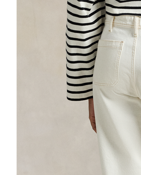 These sailor-style trousers combine a high-rise waist, wide-leg silhouette and patch pockets. Dyed for a natural hue, they're crafted from Turkish denim to achieve subtle slub character and a soft hand feel.