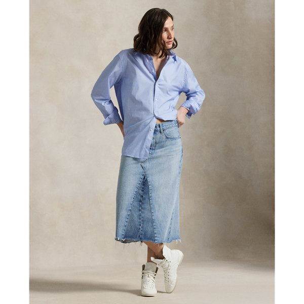 A panelled construction and A-line silhouette come together to create this cotton denim midi skirt, which is finished with distressing at the hem.