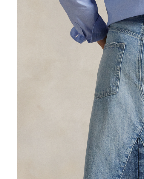 A panelled construction and A-line silhouette come together to create this cotton denim midi skirt, which is finished with distressing at the hem.