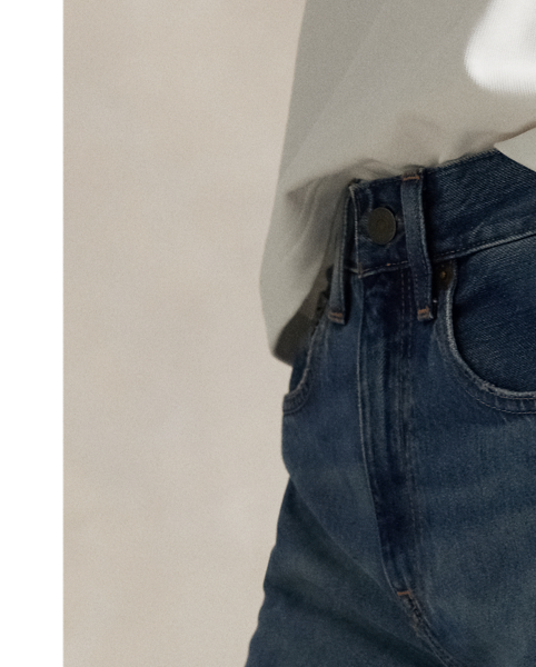 Designed for a flared silhouette, these jeans are made with soft cotton-blend denim to achieve a lightweight and open-ended vintage-inspired character. The panelled construction combines two shades of indigo for a colour-blocked effect, with grinding at the seams and uneven hand-sanding throughout.