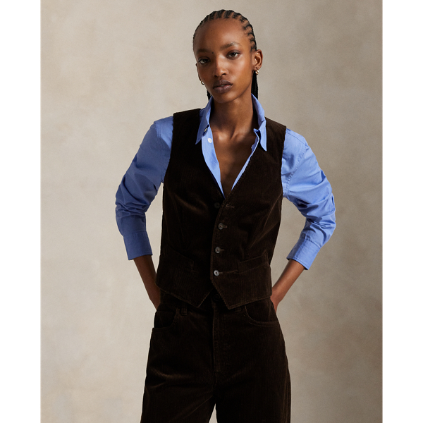 Crafted with soft, wide-wale corduroy and lined with smooth cupro twill, this menswear-inspired waistcoat is constructed with a buttoned placket, notched front hem and an adjustable buckled detail at the back waist.