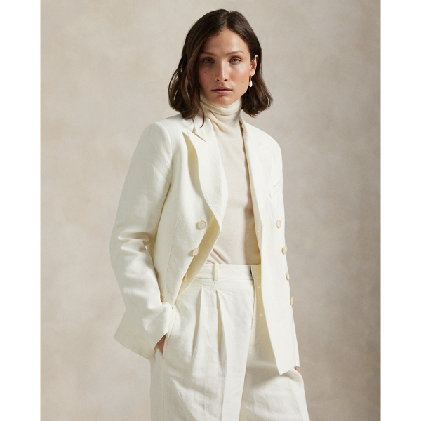 Designed for a light weight, this double-breasted blazer combines hemp fabric with a partially lined construction. The tailored silhouette features menswear-inspired details, including peak lapels and besom pockets.