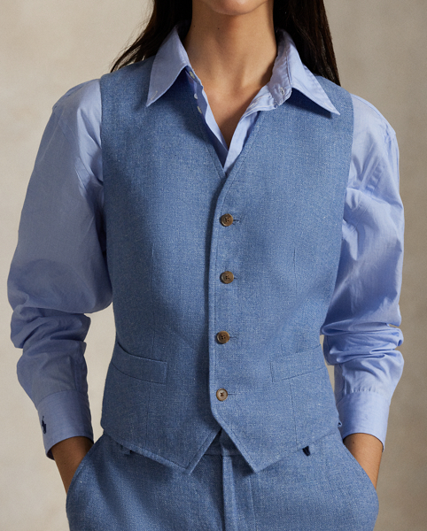 Woven with a blend of Italian linen and cotton yarns, this menswear-inspired twill waistcoat is constructed with a buttoned placket, notched front hem and an adjustable buckled detail at the back waist.